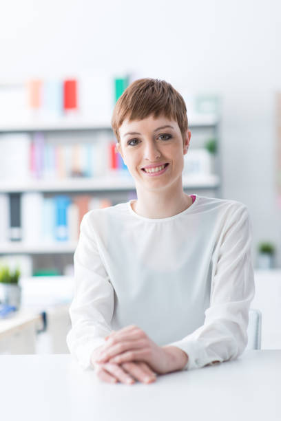 istock Smiling young woman portrait 1213450398
