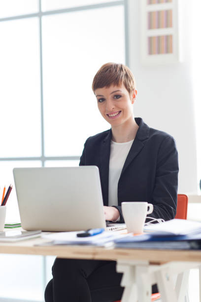 istock Confident businesswoman posing in her office 1213450426