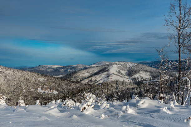istock winter mountain scenery with blue sky and clouds 1213451270
