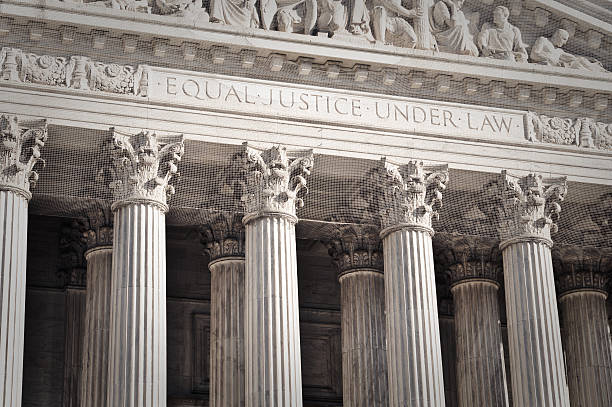 United States Supreme Court Entrance United States Supreme Court Entrance with text "Equal Justice Under Law" us supreme court building stock pictures, royalty-free photos & images