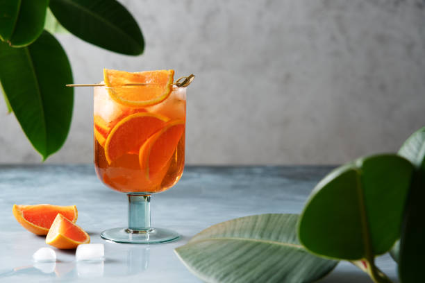 istock Spritz cocktail with oranges and ice in wine glass 1213454215