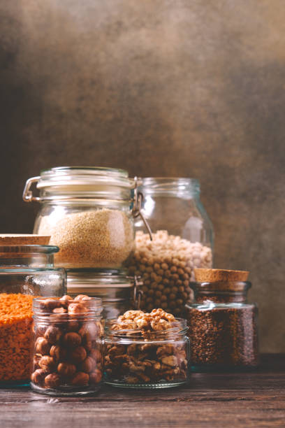 istock Grains cereals and beans in glass jars 1213454540