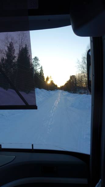 istock The snowy road seen during sunset from the bus 1213457681