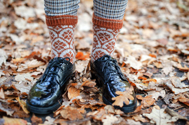 istock Black shoes and an old suitcase 1213459394