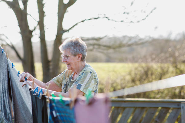 istock Pegging Out the Washing 1213461295