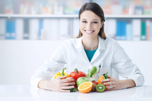 Smiling nutritionist in her office
