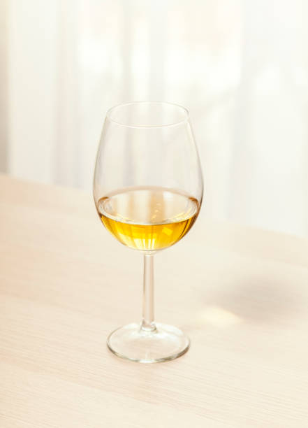 Muscat wine from Lyon, France standing on a table with bright background