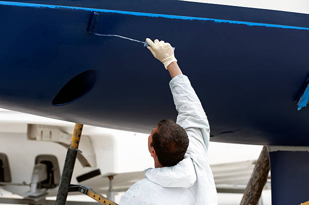 istock luxury yacht maintenance at the marina 121346351