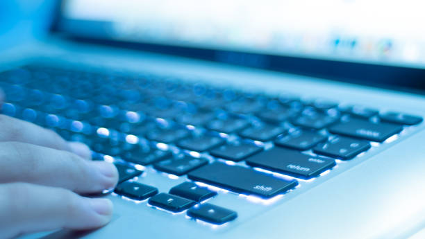 istock Laptop keyboard with lights and finder.Keyboard close up.shallow focus effect. 1213464740