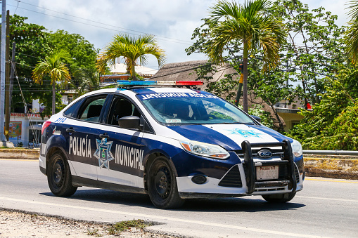 Tulum, Mexico - May 17, 2017: Police car Ford Focus in the city street.