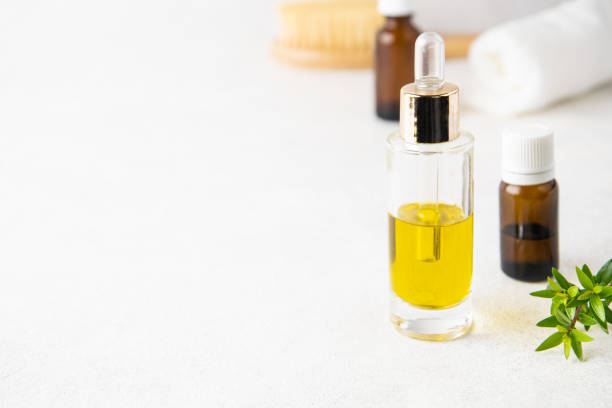 istock Selective focus on glass essential oil bottle, aromatherapy concept 1213470609