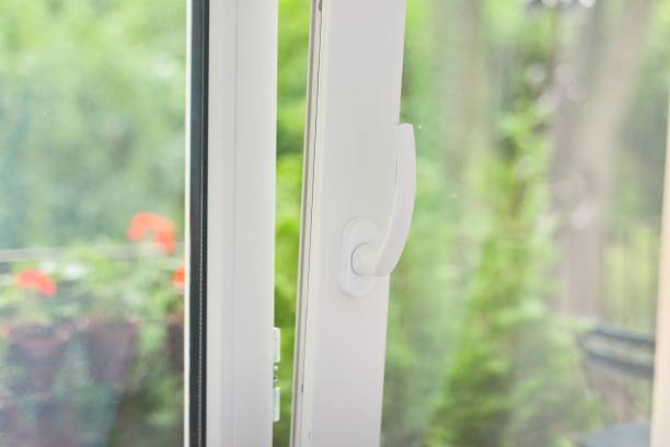 istock Glass open white plastic door to the balcony terrace 1213470703