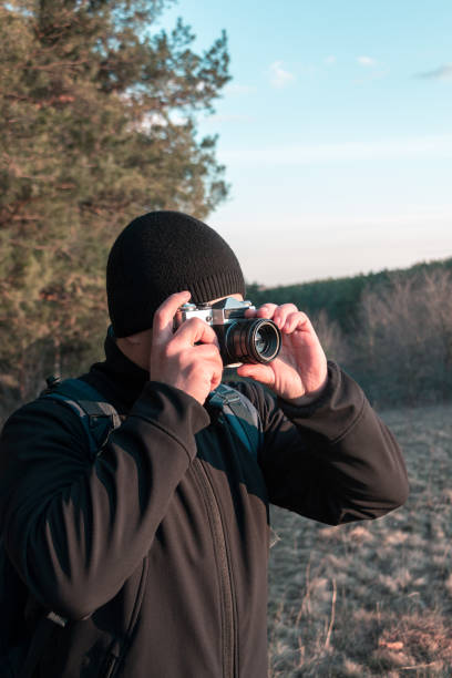 istock photographer takes photo on camera 1213473753