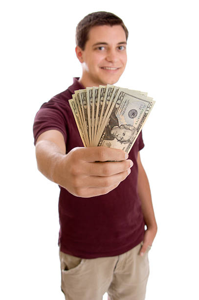 istock Teen Boy with Money 121347423