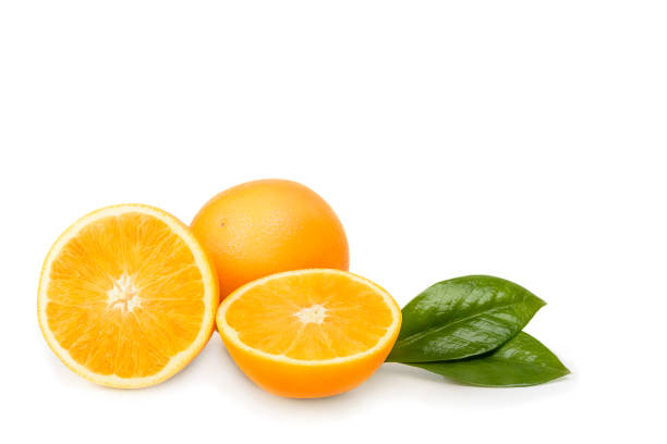 istock Orange whole and cut into halves with leaves. Isolated on a white background. 1213474480