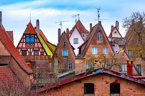 Aerial view from town wall of quaint colorful facades and roofs of medieval old town, Rothenburg ob der Tauber, Bavaria, Germany