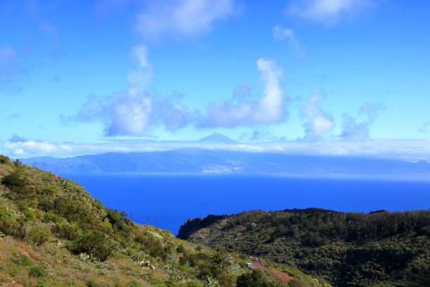 View of Tenerife and Teide mountain from La Gomera from mirador de abrante A View of Tenerife and Teide mountain from La Gomera mirador de abrante agulo stock pictures, royalty-free photos & images