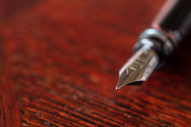 Waterman fountain pen on the wooden desk
