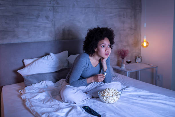 istock Woman watching scary movie 1213486723