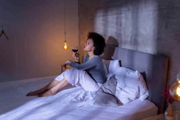 istock Woman relaxing in bed 1213486985