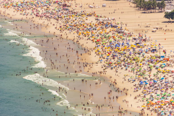 istock Copacabana beach full on a typical sunny Sunday in Rio de Janeiro 1213489400