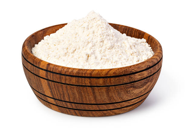 istock bowl of flour on white background 1213496264