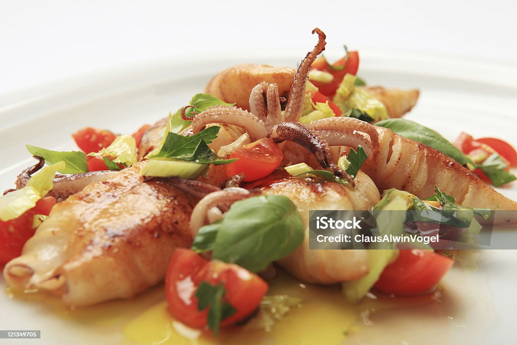 calamary fritti con erbe - Foto stock royalty-free di Tentacolo