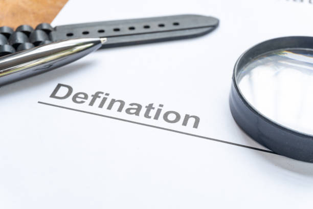 istock definition text focus word on white paper and pen background 1213501660