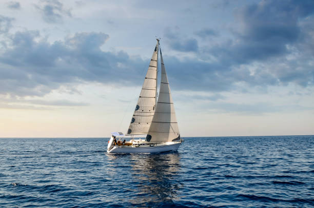 istock sailboat at sea under a magnificent sunset 1213502965