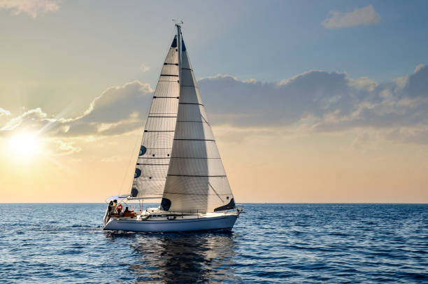 istock sailboat at sea under a magnificent sunset 1213503010