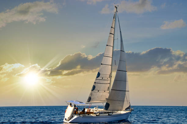 istock sailboat at sea under a magnificent sunset 1213503011