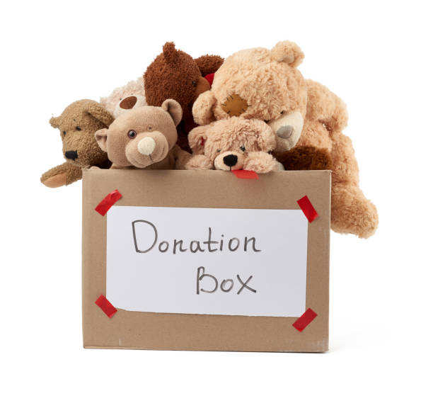 istock brown cardboard box filled with soft toys 1213503257