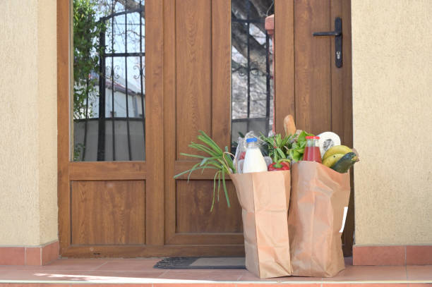 Delivering Food To A Self-isolate People or Quarantine At Home stock photo