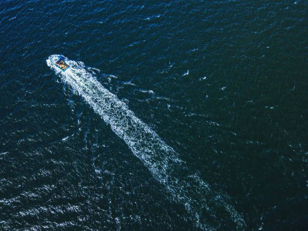 istock Fishing Boat Wake 1213503860