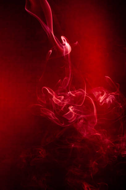 istock Red smoke motion on black background. 1213504645