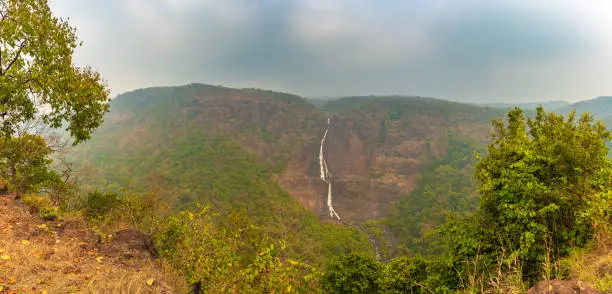Panoramic View of Barehipani Waterfall which resembles the shape of a rope locally known as Barehi in Simlipal National park, Orissa.