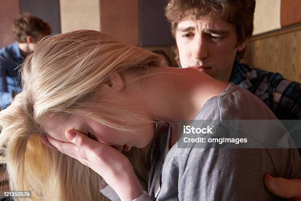 A Young Blonde Woman Looking Upset Stock Photo - Download Image Now - 20-29 Years, Adult, Cafe