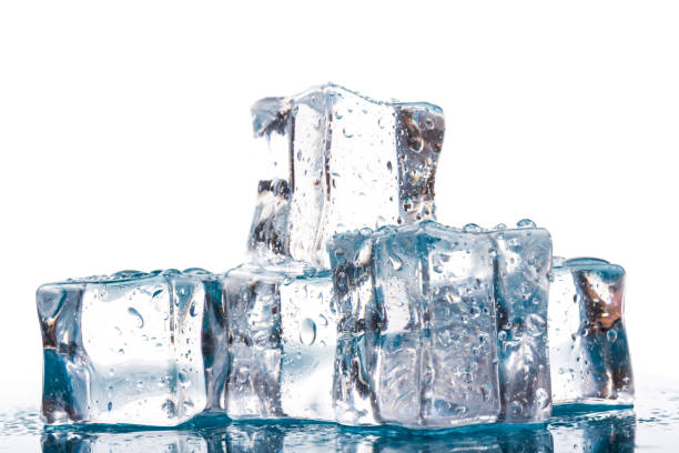 istock ice cubes and water drops close up on blue and white background 1213506208