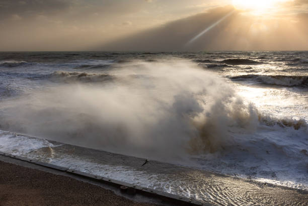 istock Storm at sea, storm warning on the coast. Thunderclouds and big sea waves during a storm. - image 1213506674