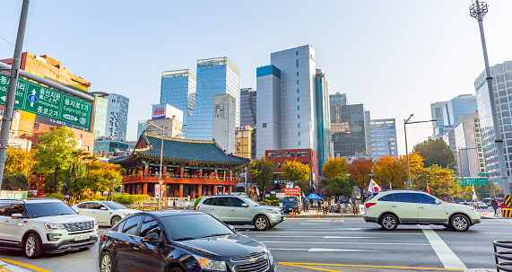 This pic shows Seoul downtown with modern office buildings, road and skyscraper.Modern part of Seoul in South Korea. STreet road and cars and modern buildings can be seen in the pic. The pic is taken in november 2019 in seoul.