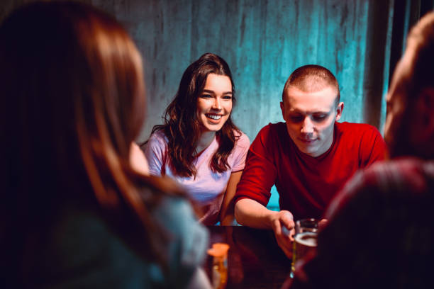 istock Cute Friends Spending Time Together With Drinks In Restaurant 1213506975