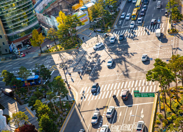 Aerial view of the traffic in Seoul, Korea. This pic shows Aerial view of the road with cars and traffic in Seoul city. The pic is taken from above and on day time. The pic is taken in november 2019 in seoul city south korea. seoul bus stock pictures, royalty-free photos & images
