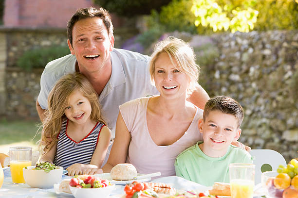 istock Family Enjoying A Barbeque 121350761
