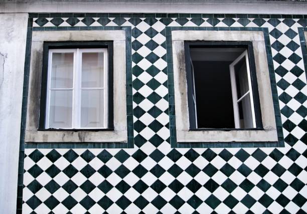 istock Typical vintage portuguese facade with old window 1213507923