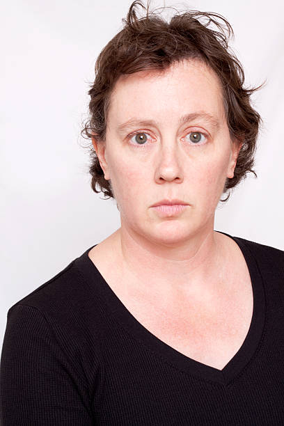 istock Short Haired Caucasian Woman Looking at Camera Eyes Wide 121351000