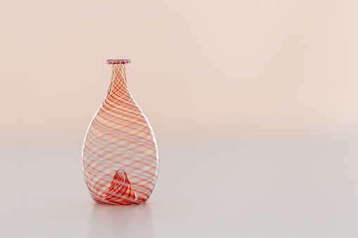 Glass vase - single vase on light background, space for copy