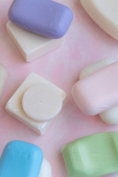 istock Different handmade  bar soaps on pink background. Hygiene, artisanal products 1213519464