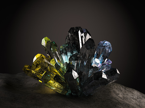 A crystal and stone cluster with clear white quartz, silver metallic pyrite and black tourmaline surrounded by matrix macro close up isolated on a white surface background