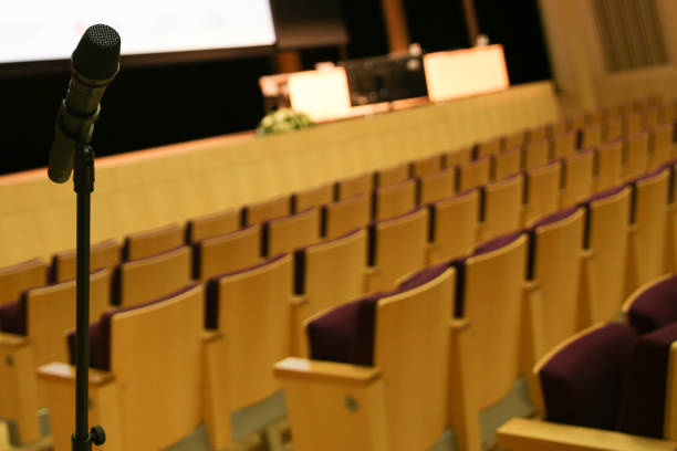 istock Microphone in concert hall or conference room 1213521425