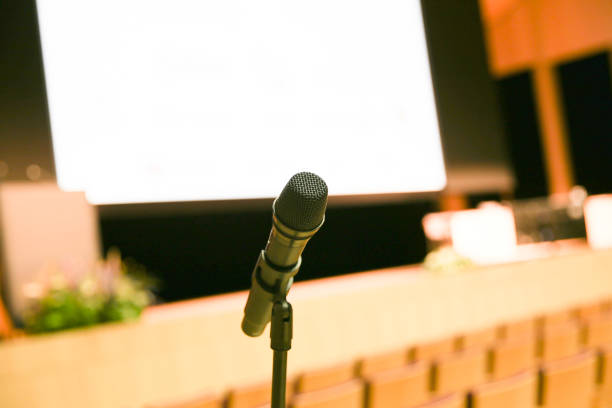 istock Microphone in concert hall or conference room 1213521543
